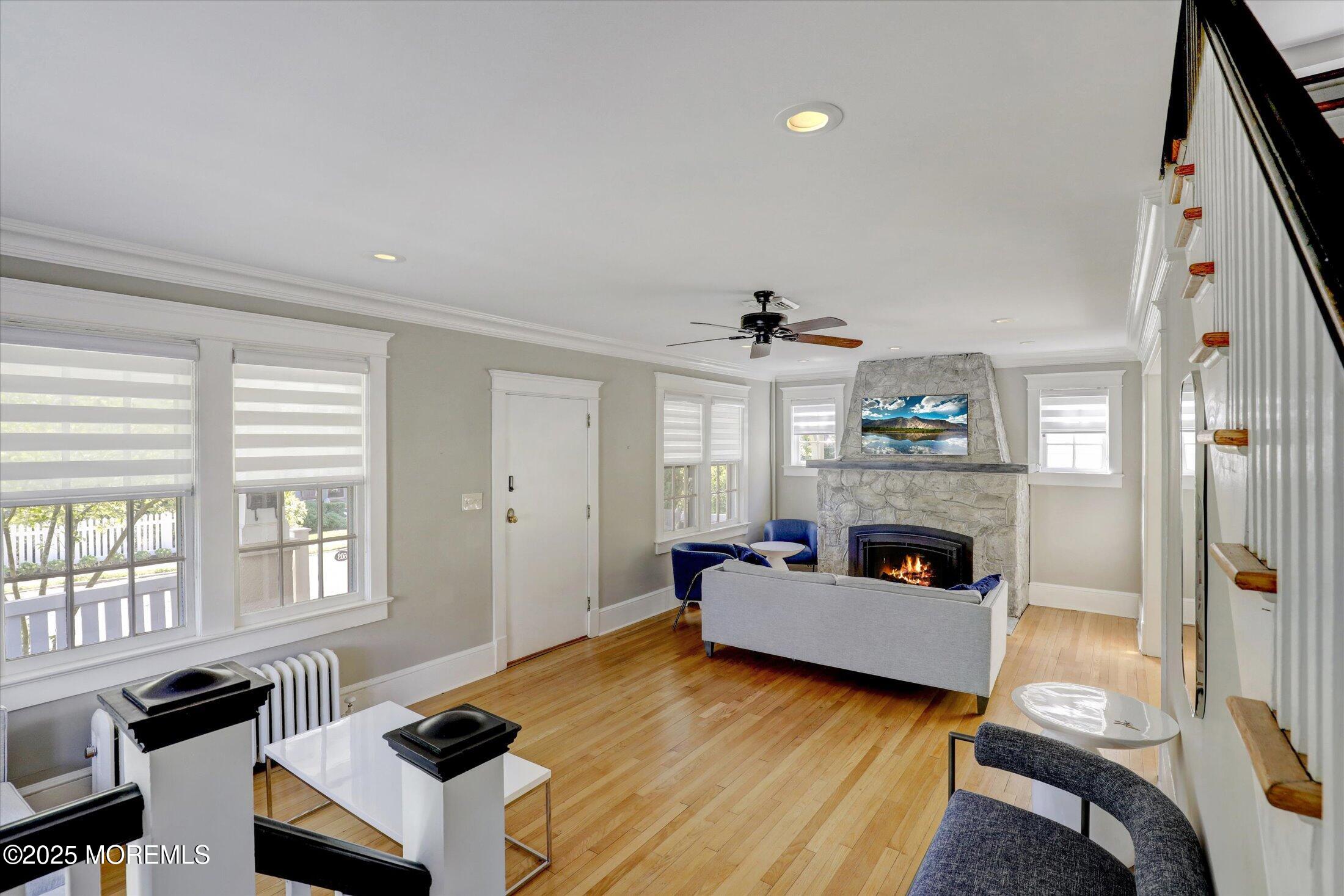 603 Laurel Avenue West Allenhurst, NJ 07711 - Photo 7 of 67 a living room with furniture and a fireplace