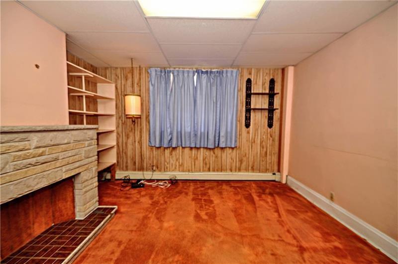 505 Noblestown Road Carnegie, PA 15106 - Photo 6 of 24 a view of a room with wooden floor and a window