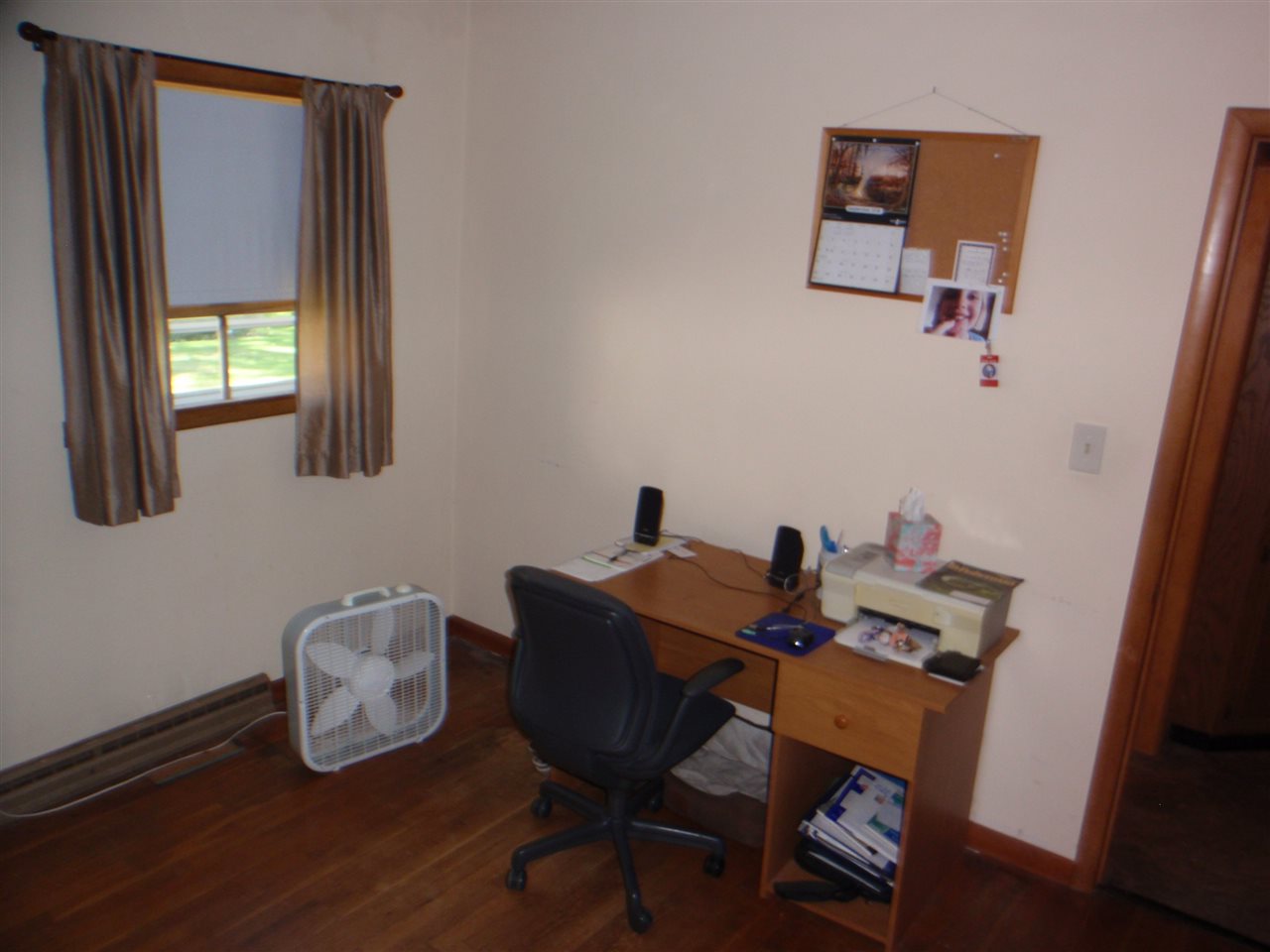 8587 Pomeroy Road Rockton, IL 61072 - Photo 12 of 20 a view of a workspace with furniture and wooden floor