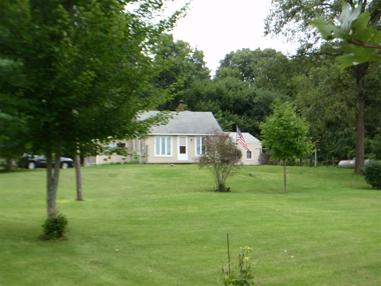 8587 Pomeroy Road Rockton, IL 61072 - Photo 16 of 20 a house that is sitting in the forest