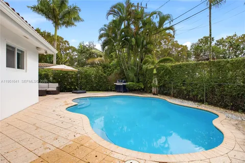 a view of a swimming pool with an outdoor space