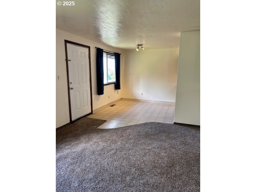 202-204 Northwest 14th Street Pendleton, OR 97801 - Photo 11 of 15 a view of a hallway with brick walls