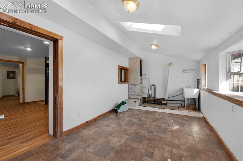 27720 Mid Jones Road Calhan, CO 80808 - Photo 17 of 43 a living room with furniture and a table