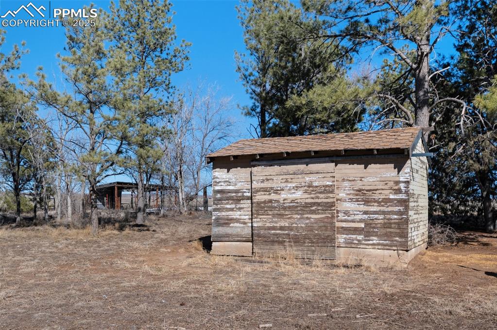 27720 Mid Jones Road Calhan, CO 80808 - Photo 25 of 43 a view of house with tree in the background