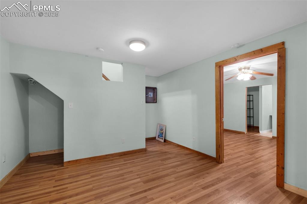 27720 Mid Jones Road Calhan, CO 80808 - Photo 31 of 43 a view of a livingroom with wooden floor