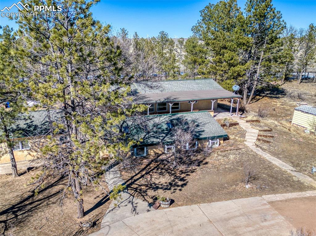 27720 Mid Jones Road Calhan, CO 80808 - Photo 35 of 43 a view of a patio with wooden fence