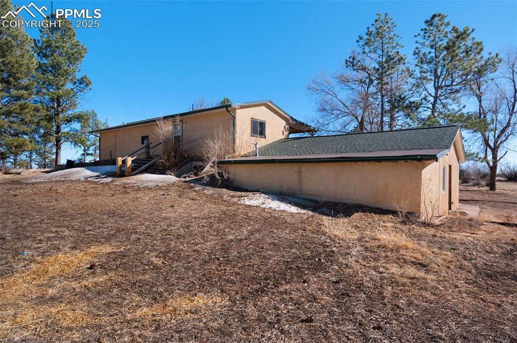 27720 Mid Jones Road Calhan, CO 80808 - Photo 39 of 43 a front view of a house with a yard