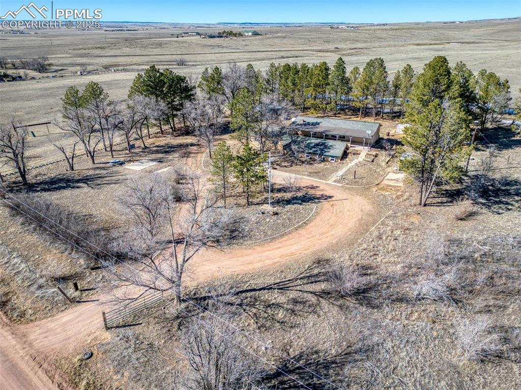27720 Mid Jones Road Calhan, CO 80808 - Photo 5 of 43 a view of a lake with outdoor space