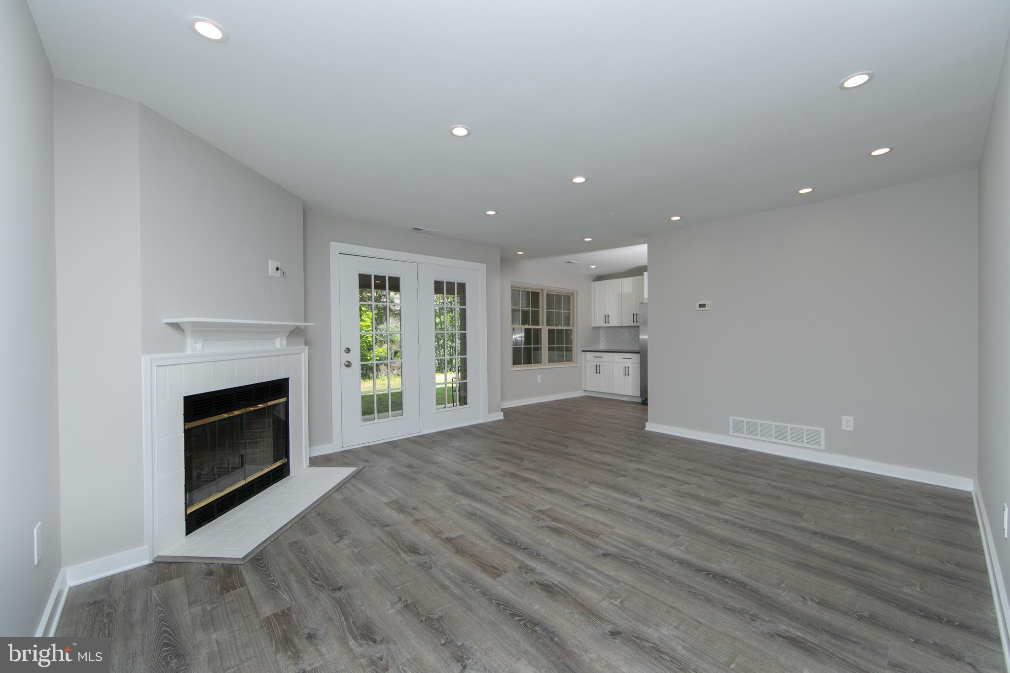 306 Tavistock Road Cherry Hill, NJ 08034 - Photo 4 of 33 Great room with wood burning fireplace