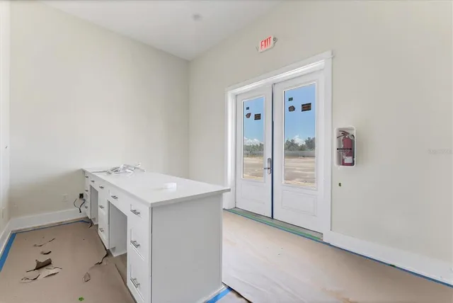 a view of a backyard with sitting area