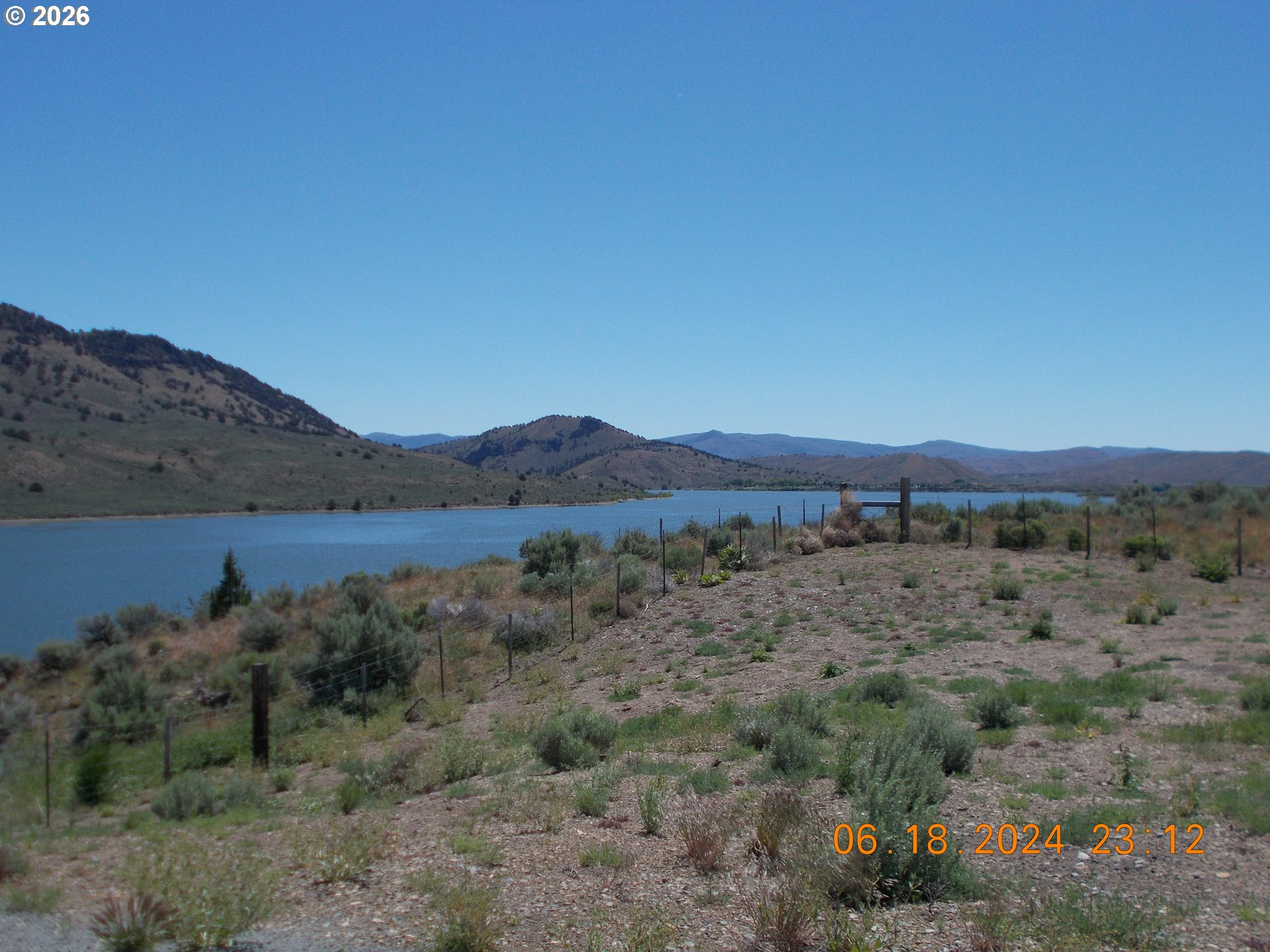 31841 Rice Road Unity, OR 97884 - Photo 22 of 27 a view of a dry field with trees in the background
