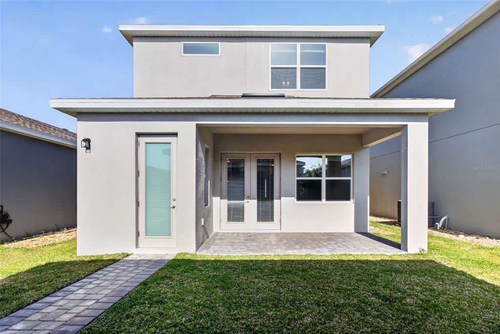 810 MIDDLETON Street DeBary, FL 32713 - Photo 50 of 52 a front view of a house with a yard