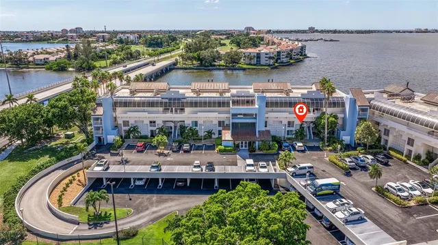 an aerial view of a house with yard swimming pool and outdoor seating