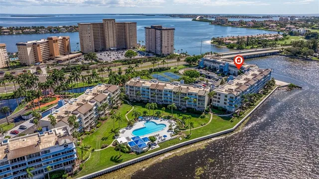 a view of a backyard with outdoor seating