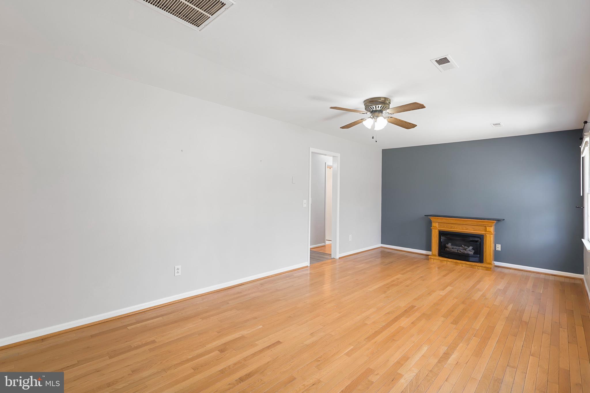 15366 Black Hill Road Rixeyville, VA 22737 - Photo 13 of 35 a view of an empty room with a ceiling fan