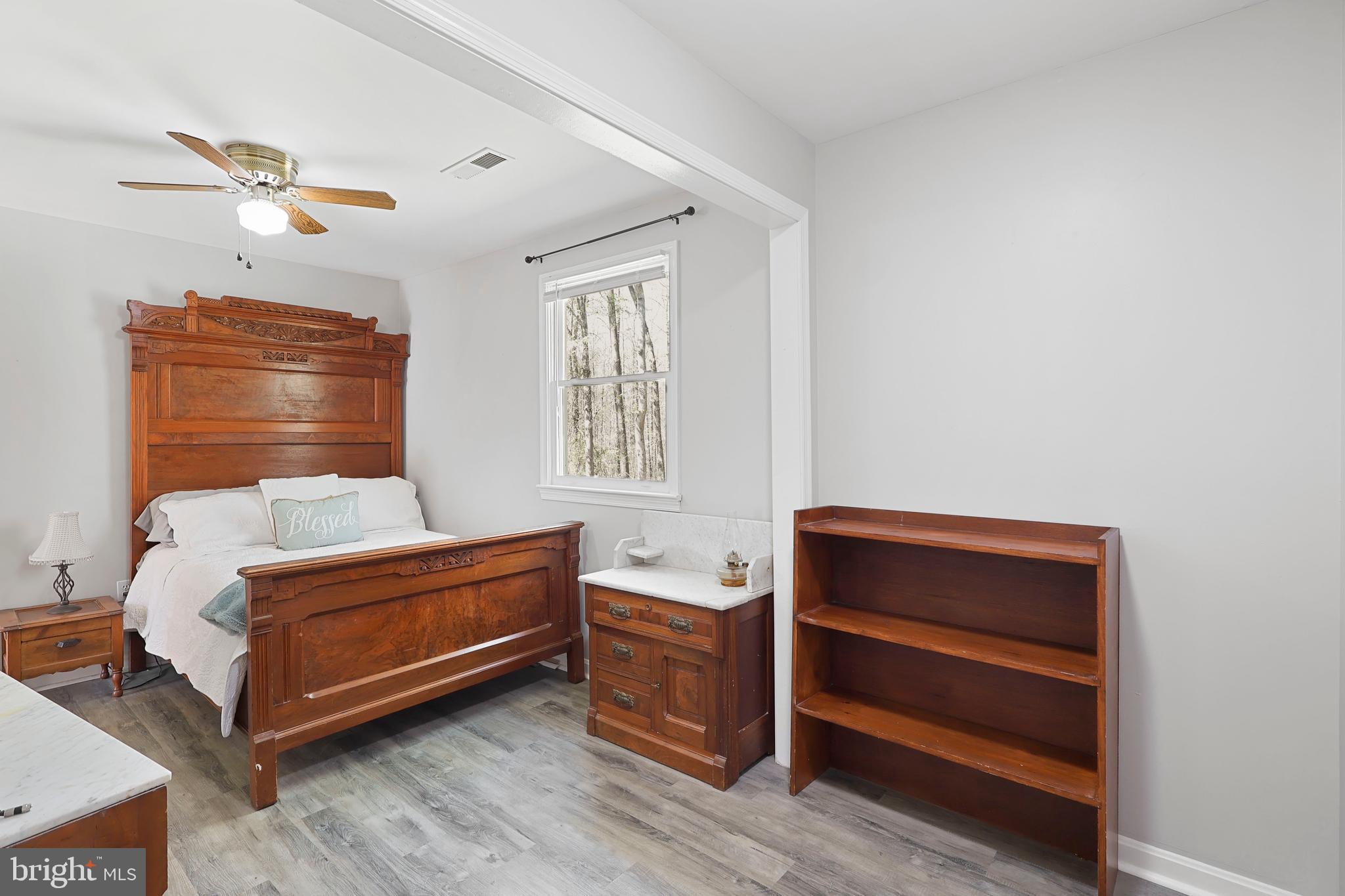 15366 Black Hill Road Rixeyville, VA 22737 - Photo 25 of 35 a bedroom with furniture and window