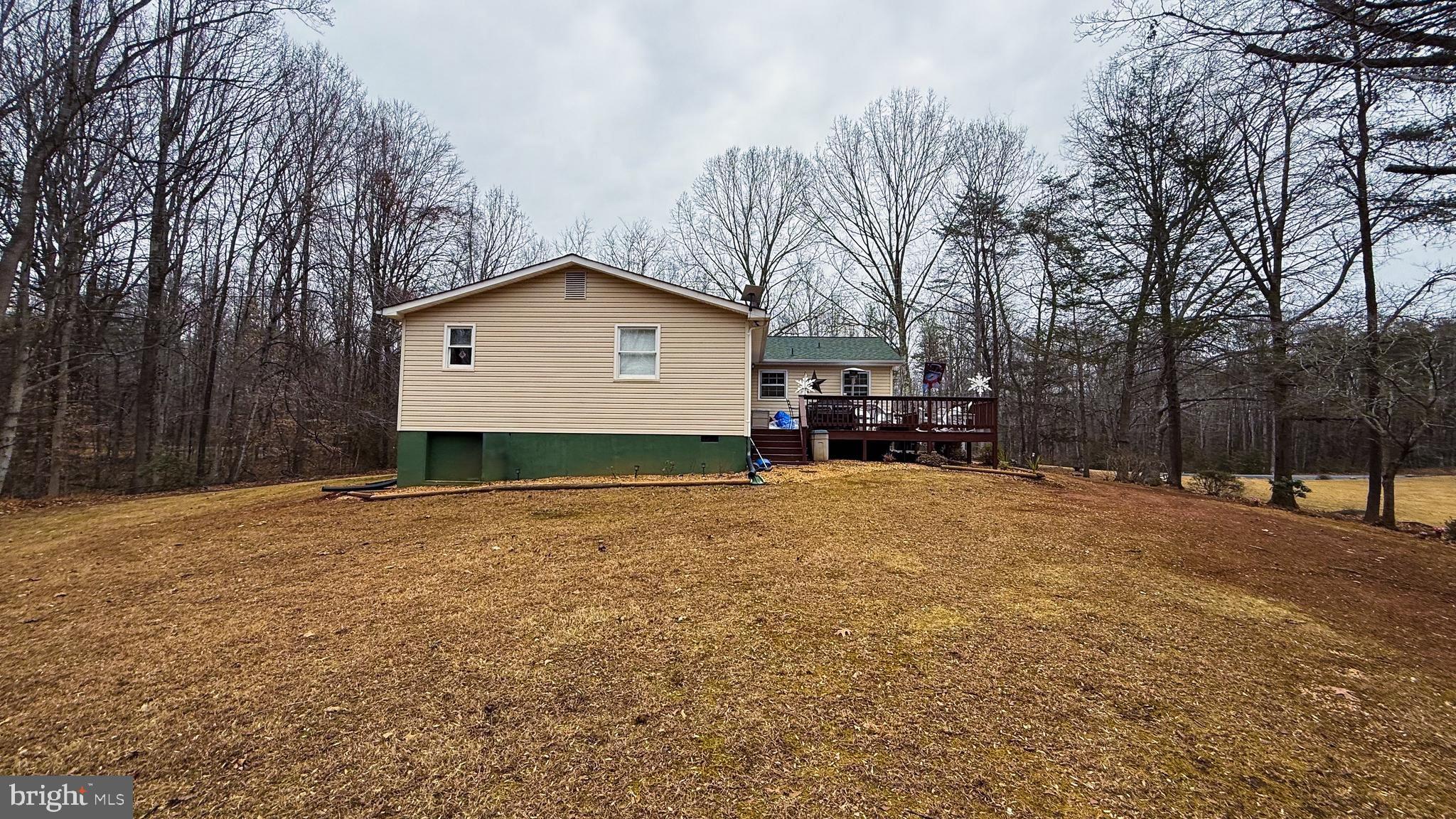 15366 Black Hill Road Rixeyville, VA 22737 - Photo 10 of 35 a house with trees in front of it