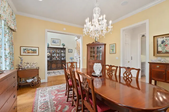 a dining room with furniture and windows