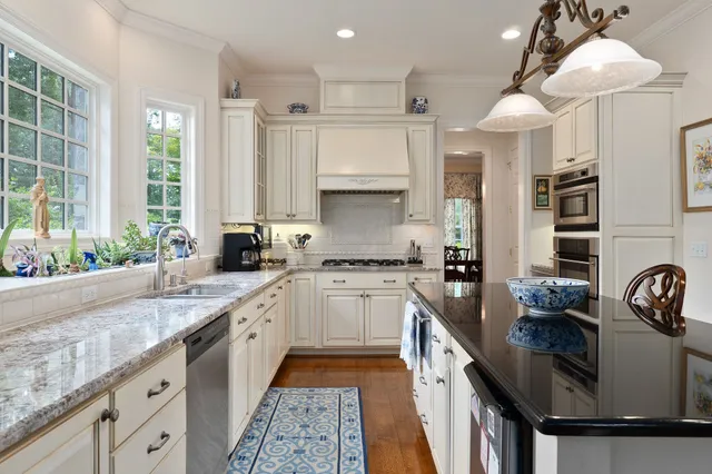 a view of entryway with livingroom and wooden floor