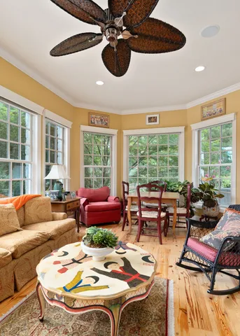 a living room with furniture and a window