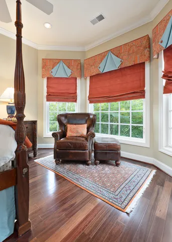 a view of a storage room with racks on the wall