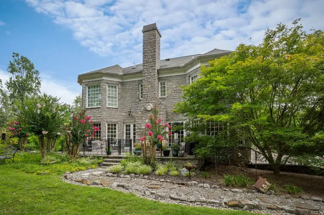 a front view of building with yard