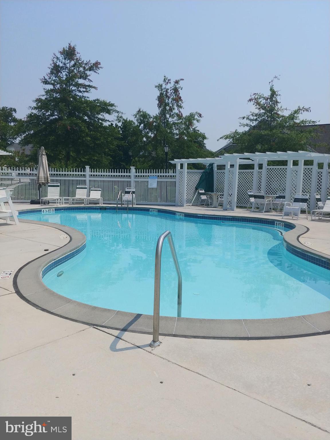 7208 Paperbark Terrace Laurel, MD 20707 - Photo 13 of 14 Outdoor pool, there is large indoor lap pool also