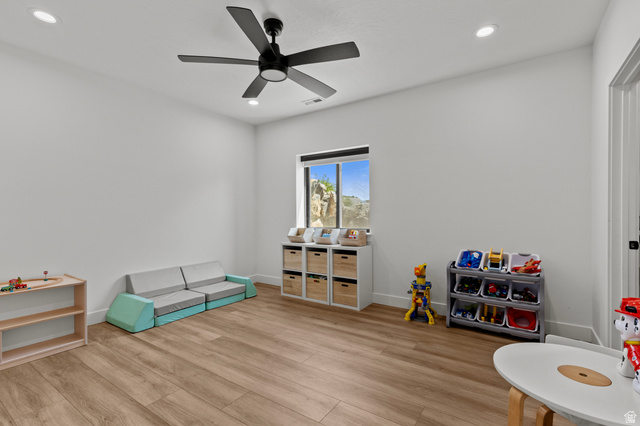 3111 South 1250 West Logan, UT 84321 - Photo 36 of 51 Spacious room featuring wood-finish flooring, recessed lighting, and a modern ceiling fan