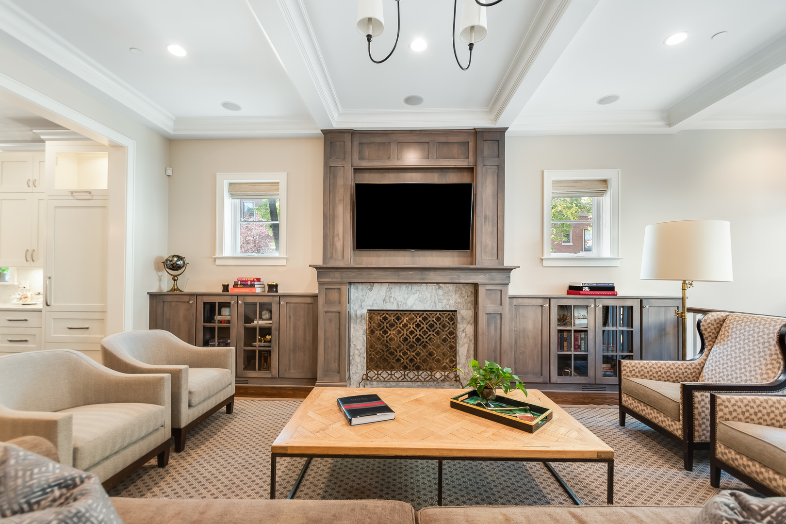 1480 West Grace Street Chicago, IL 60613 - Photo 12 of 41 a living room with furniture a flat screen tv and a fireplace