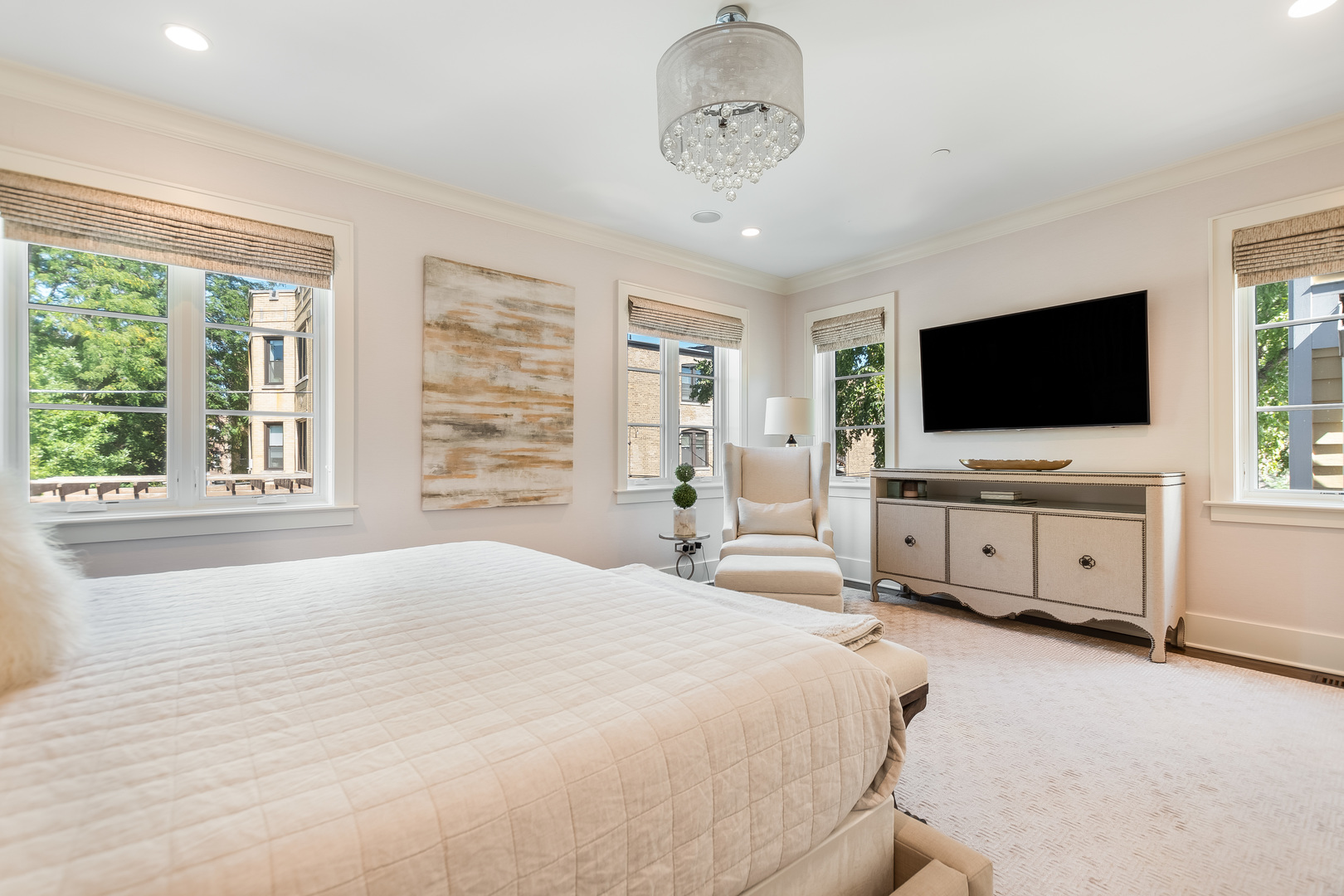 1480 West Grace Street Chicago, IL 60613 - Photo 19 of 41 a bedroom with a bed and a flat screen tv