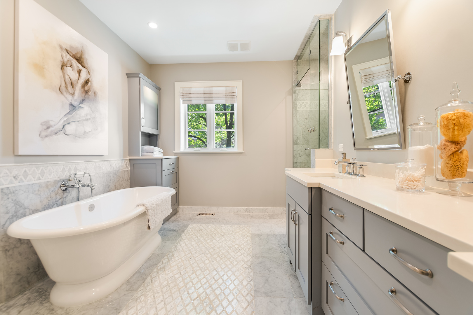 1480 West Grace Street Chicago, IL 60613 - Photo 20 of 41 a bathroom with a white tub a sink and a window