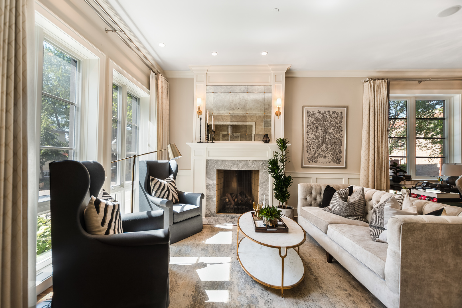 1480 West Grace Street Chicago, IL 60613 - Photo 3 of 41 a living room with furniture a fireplace and large windows