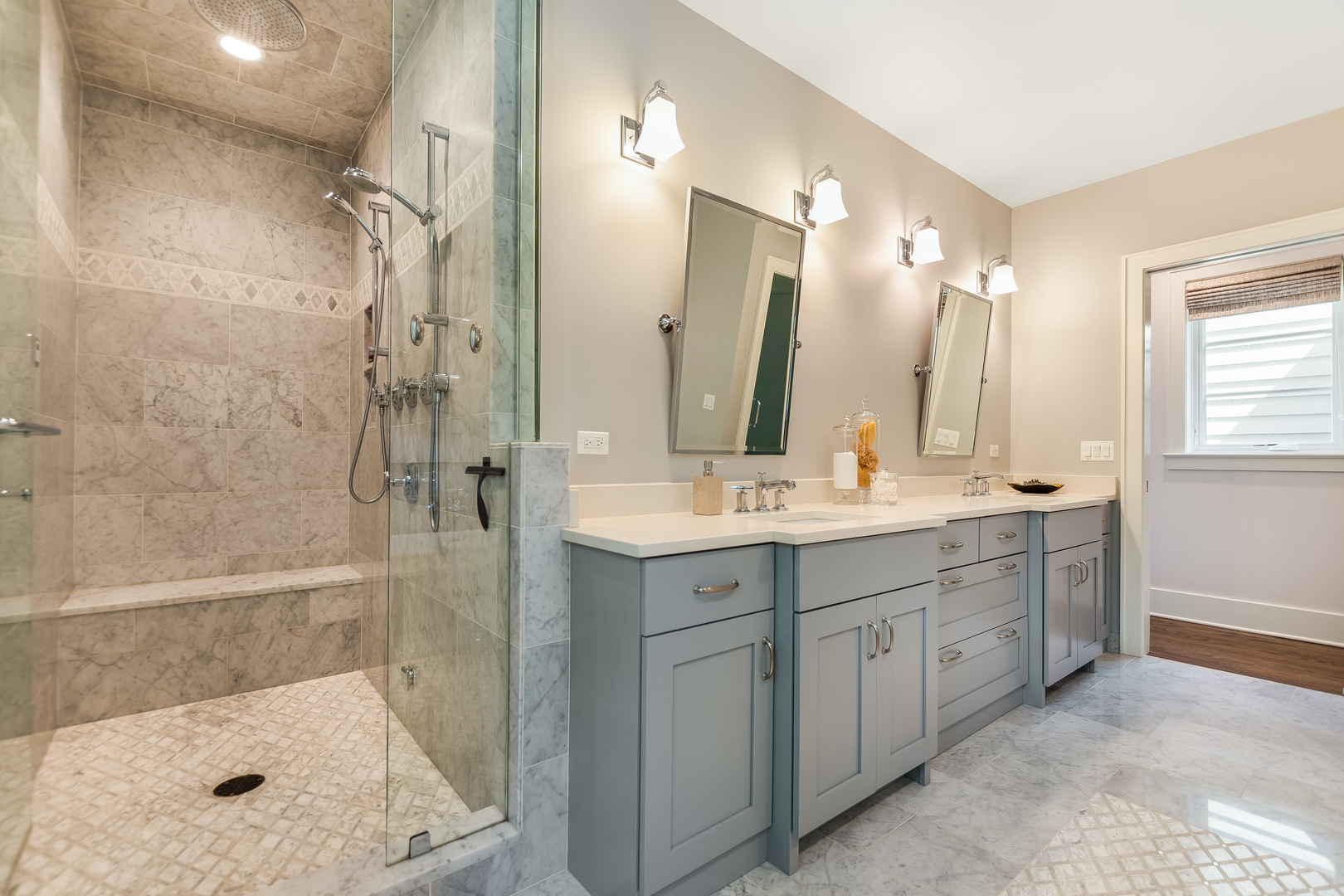 1480 West Grace Street Chicago, IL 60613 - Photo 21 of 41 a bathroom with a double vanity sink mirror double shower and a bathtub