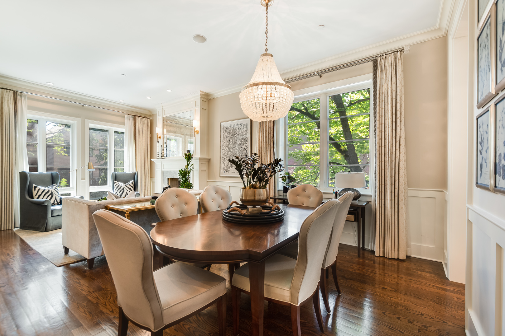 1480 West Grace Street Chicago, IL 60613 - Photo 5 of 41 a view of a dining room with furniture wooden floor and chandelier