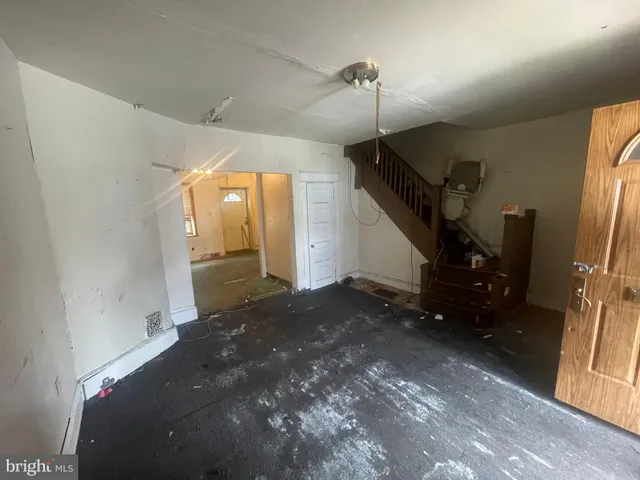 a kitchen with stainless steel appliances a refrigerator stove and sink