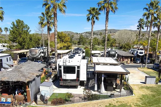 a view of multiple houses with a yard