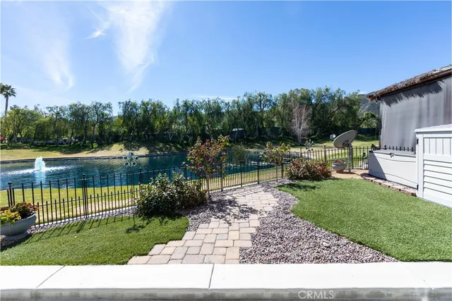 a view of a park with large trees