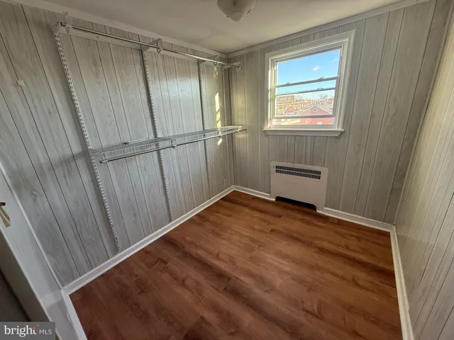 a view of empty room with windows