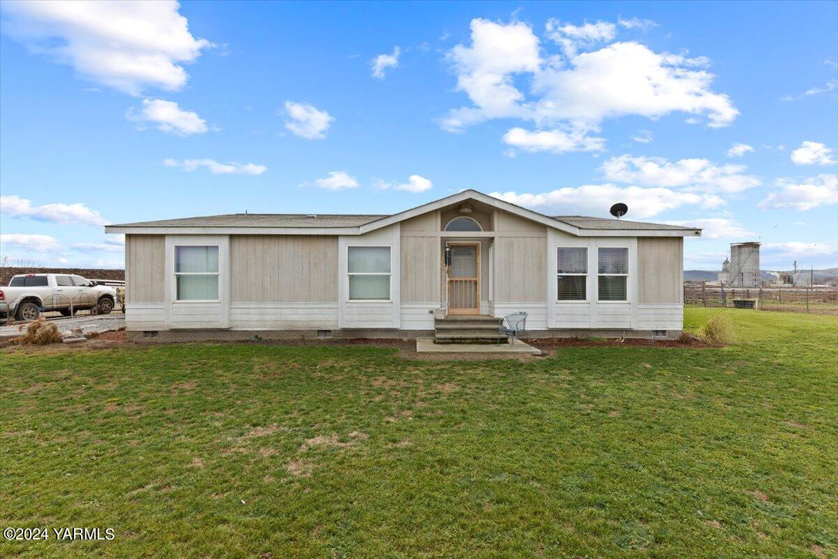 50 Elenbaas Road Granger, WA 98932 - Photo 2 of 35 a view of a house with a yard