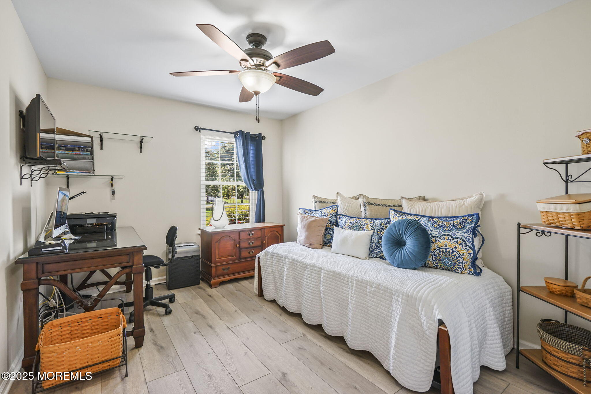 126 Wyckoff Mills Road, Unit 84 Hightstown, NJ 08520 - Photo 6 of 16 a bedroom with furniture and a window