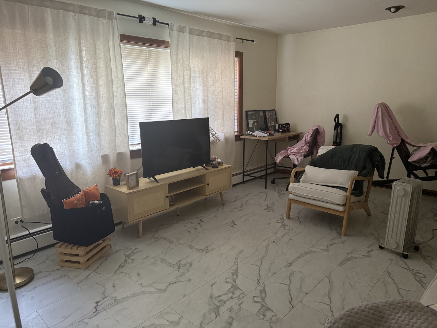 2233 Des Plaines Avenue North Riverside, IL 60546 - Photo 16 of 28 a living room with furniture and a flat screen tv