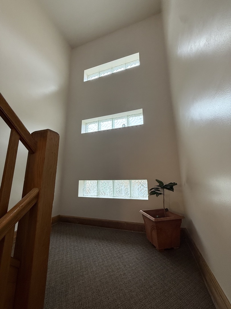 2233 Des Plaines Avenue North Riverside, IL 60546 - Photo 4 of 28 a room with furniture and window