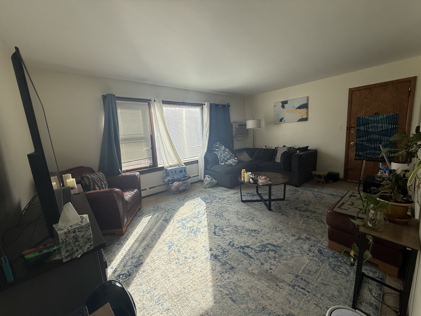 2233 Des Plaines Avenue North Riverside, IL 60546 - Photo 8 of 28 a living room with furniture and a flat screen tv