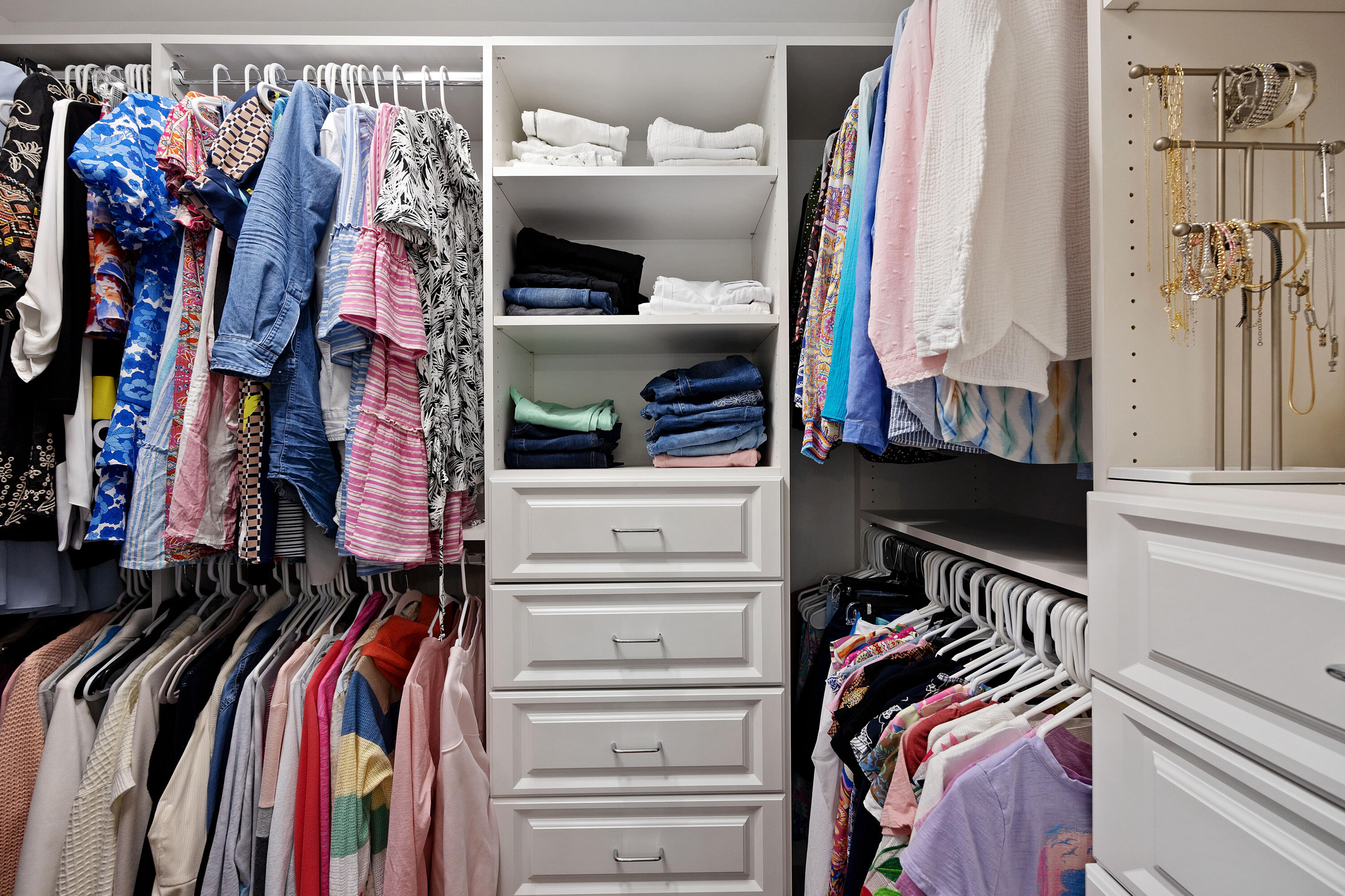 2401 Marina Isle Way, Unit 503 Jupiter, FL 33477 - Photo 20 of 30 a view of walk in closet with clothes and shoes