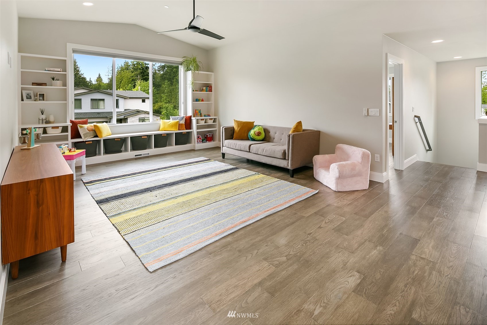 236 234th Place Southeast Bothell, WA 98021 - Photo 29 of 39 a living room with furniture and a large window
