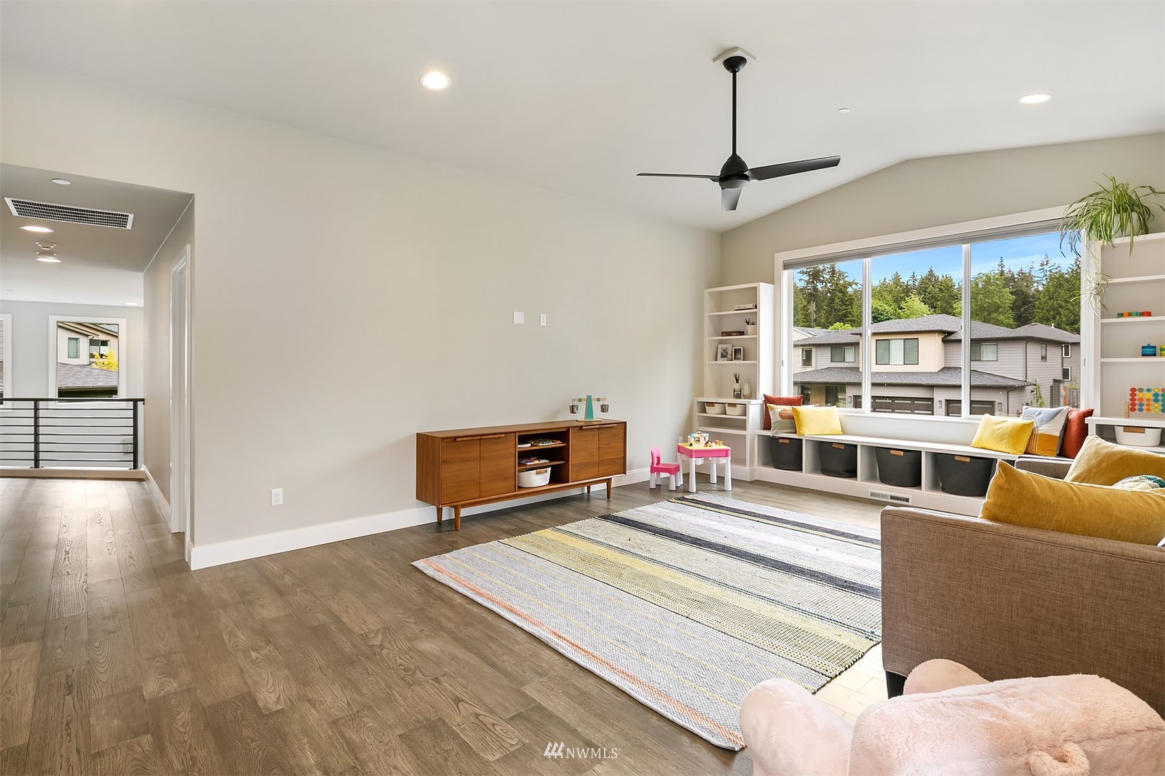 236 234th Place Southeast Bothell, WA 98021 - Photo 30 of 39 a living room with furniture a window and appliances