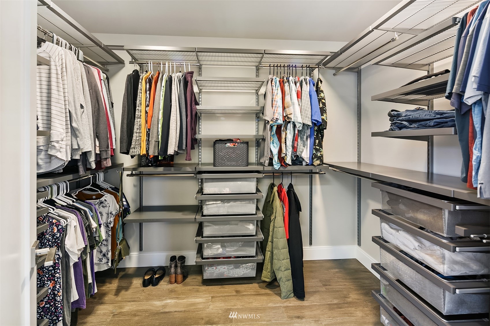 236 234th Place Southeast Bothell, WA 98021 - Photo 34 of 39 a view of walk in closet with clothes and shoes