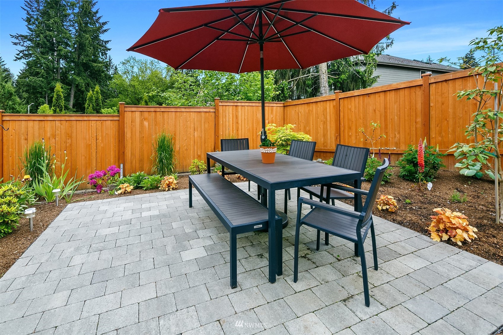 236 234th Place Southeast Bothell, WA 98021 - Photo 37 of 39 a table and chairs in the patio