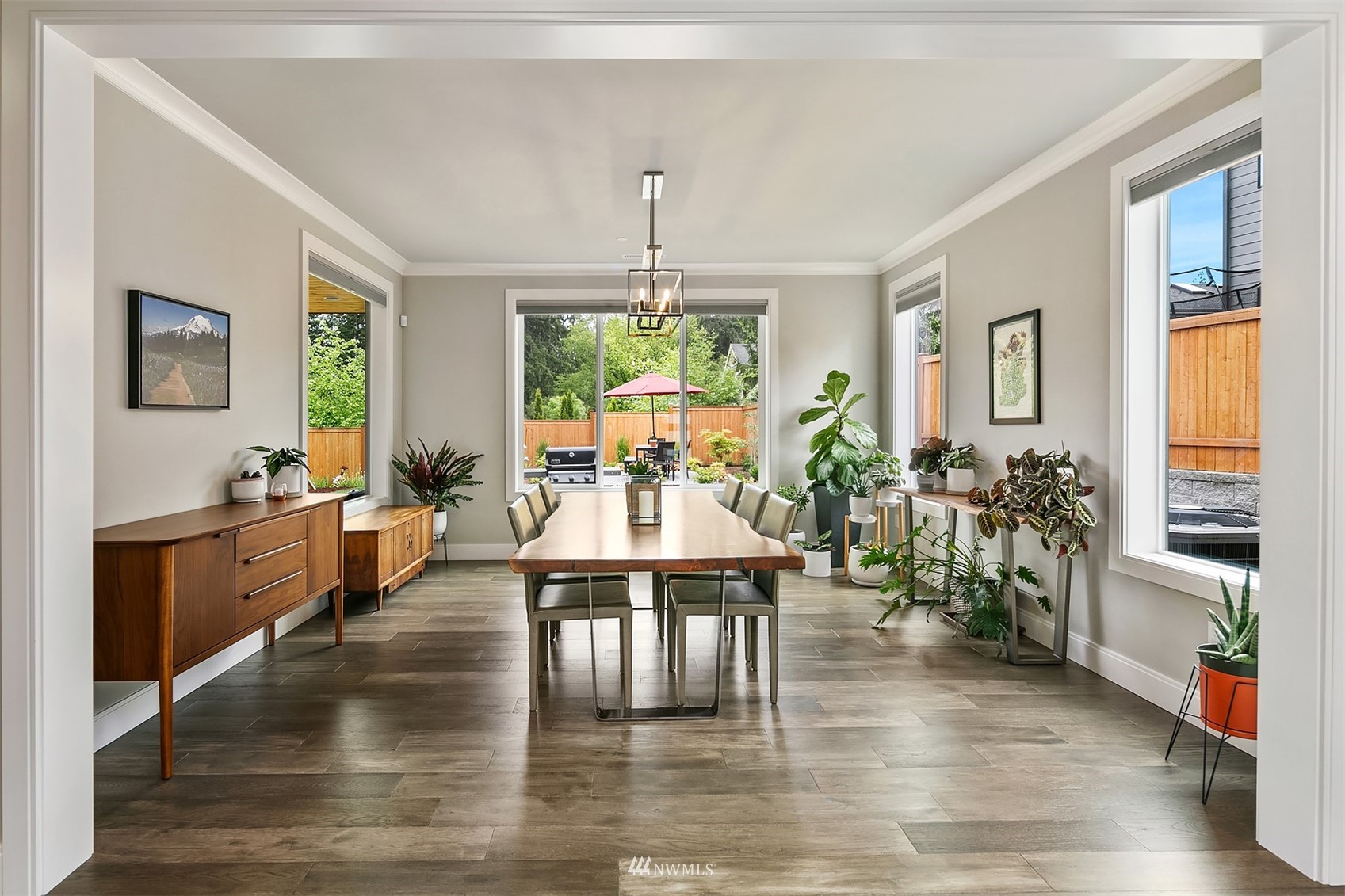 236 234th Place Southeast Bothell, WA 98021 - Photo 6 of 39 a view of a dining room with furniture window and wooden floor