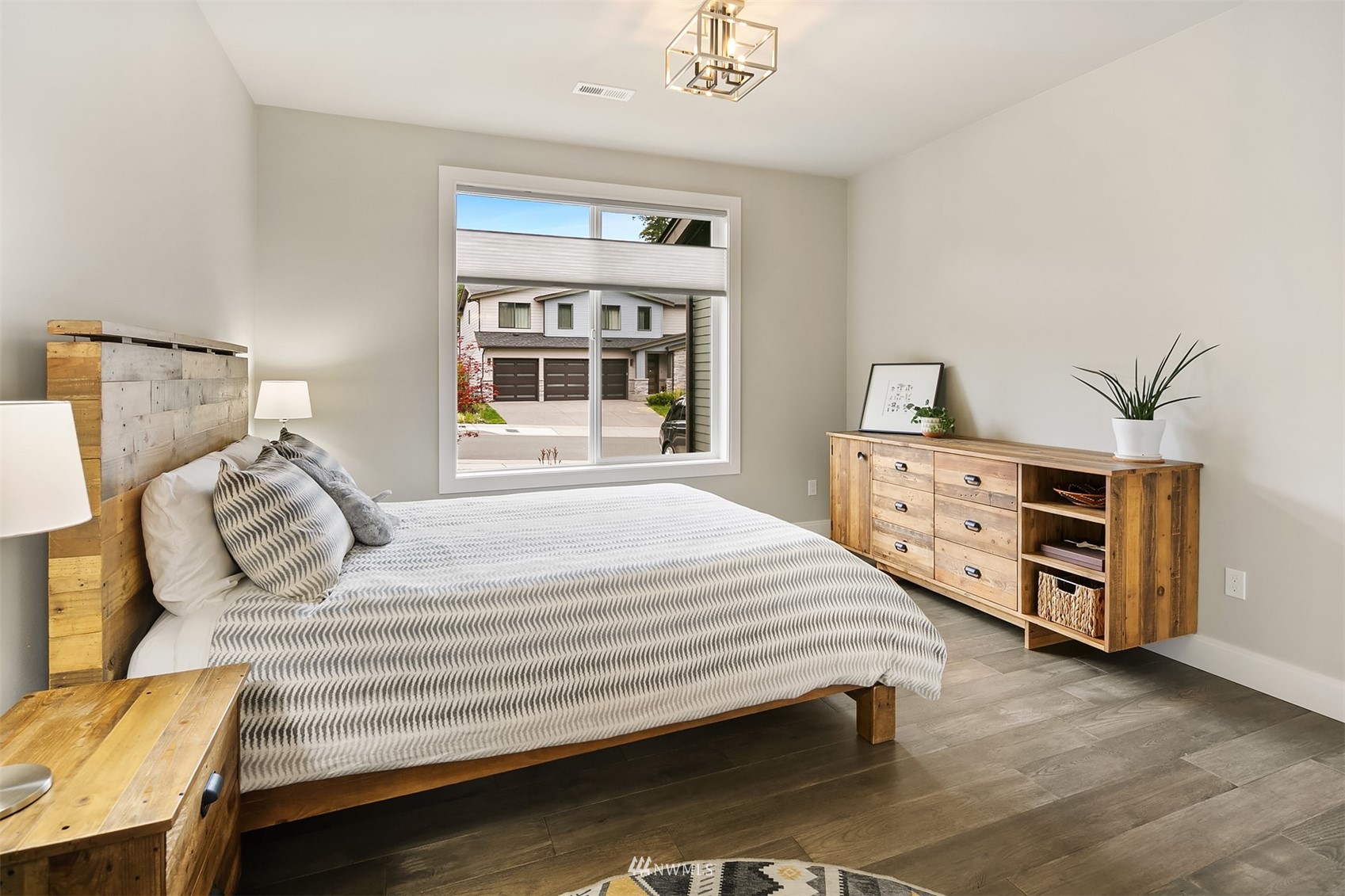 236 234th Place Southeast Bothell, WA 98021 - Photo 8 of 39 a bedroom with a bed and a window